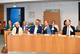 Stadtpräsidentin von Neumünster, Anna-Katharina Schättinger, Minister Claus Ruhe Madsen, Oberbürgermeister von Neumünster, Tobias Bergmann, und Geschäftsführer der NAH.SH, Dr. Arne Beck, im Ratssaal